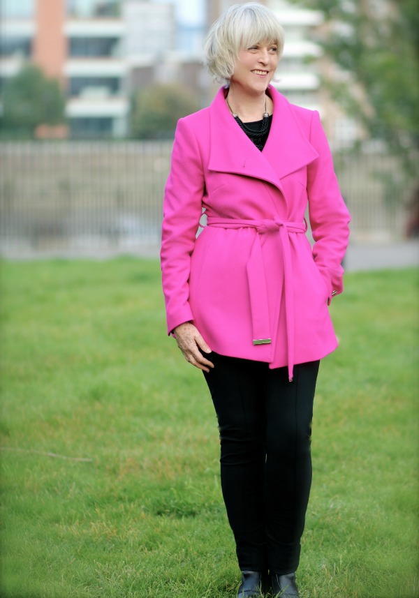How to style a pink jacket with tie belt