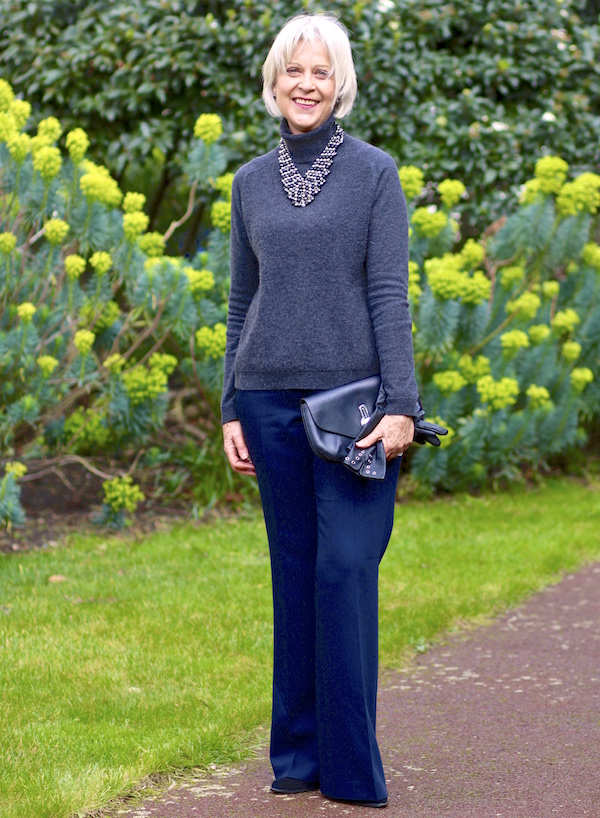 Grey polo sweater & navy trousers
