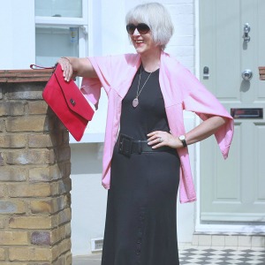 black dress pink cardigan