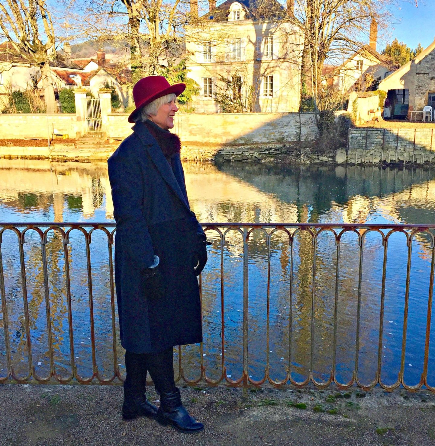 warm coat and red hat to keep warm in Chablis