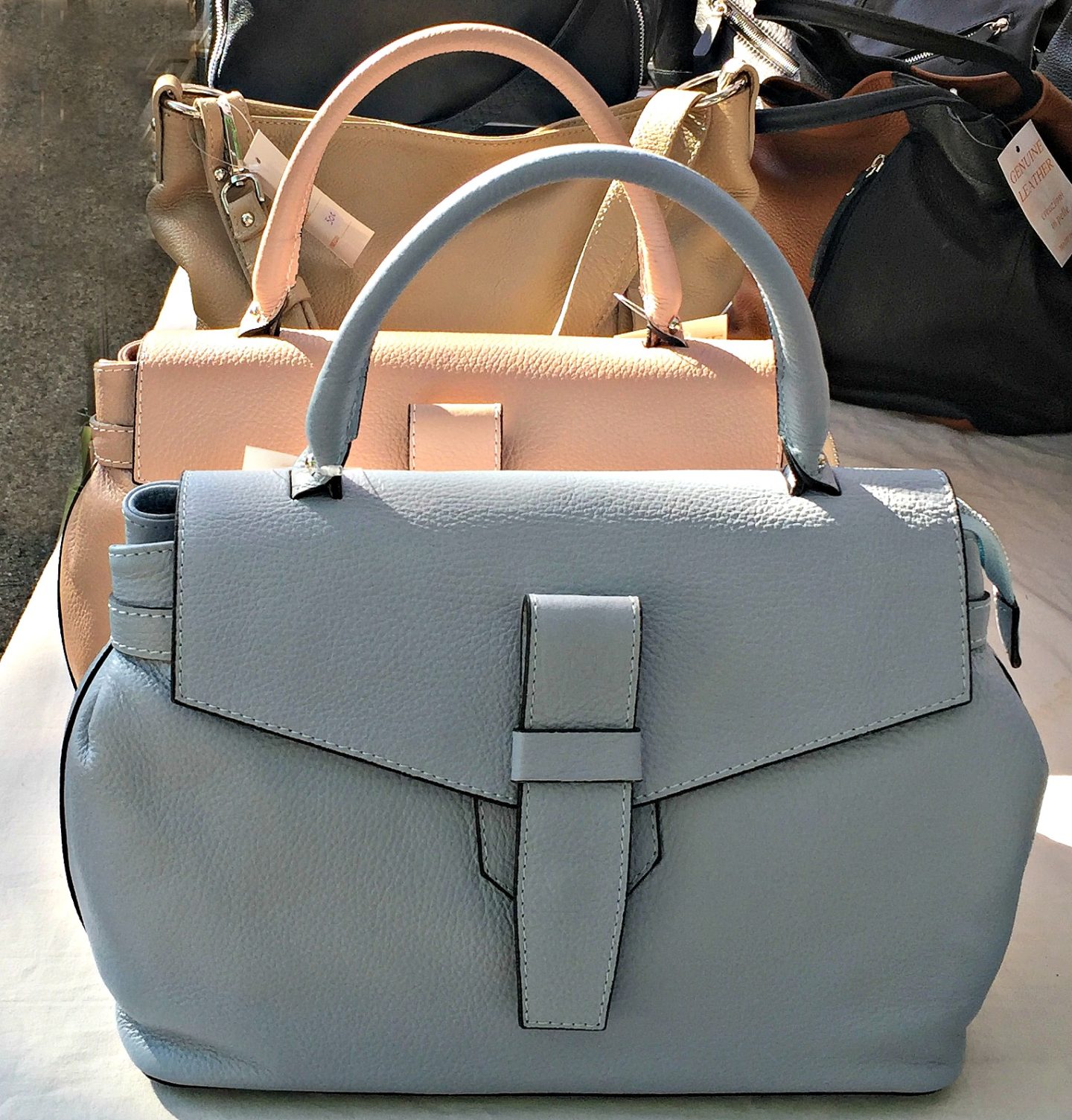 Pastel coloured handbags