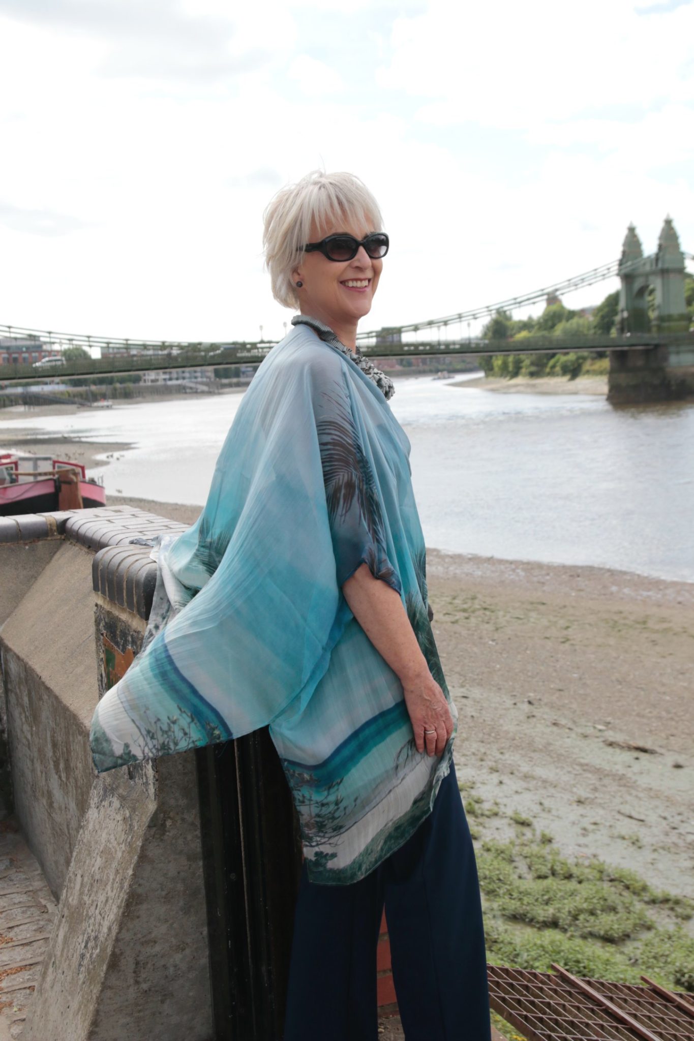 Silk chiffon printed top and navy trousers
