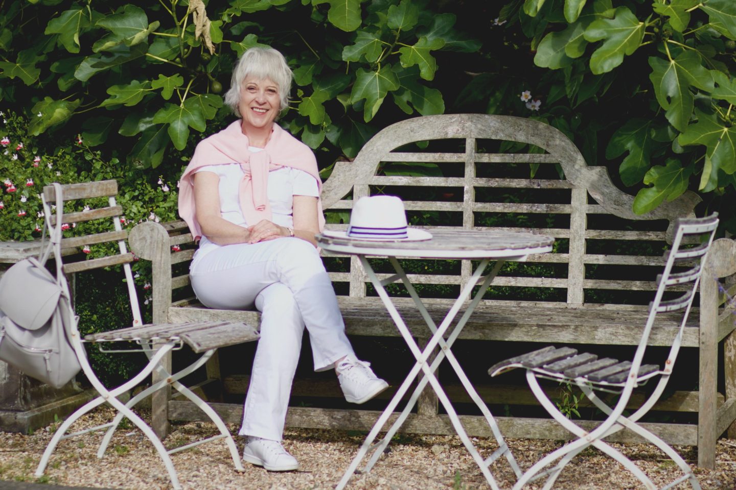 Pink sweater and white jeans