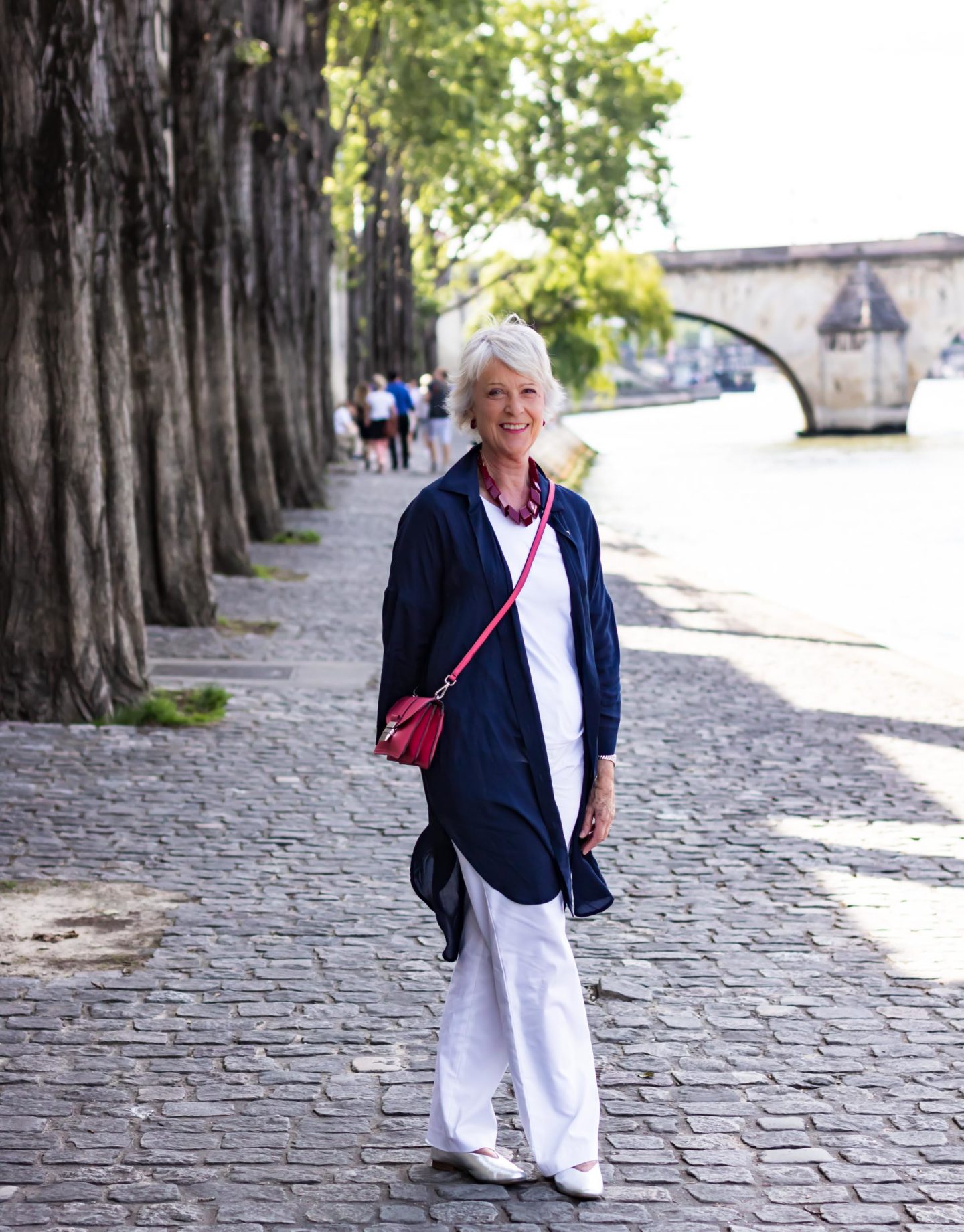 White trousers and tee shirt with navy shirtdress