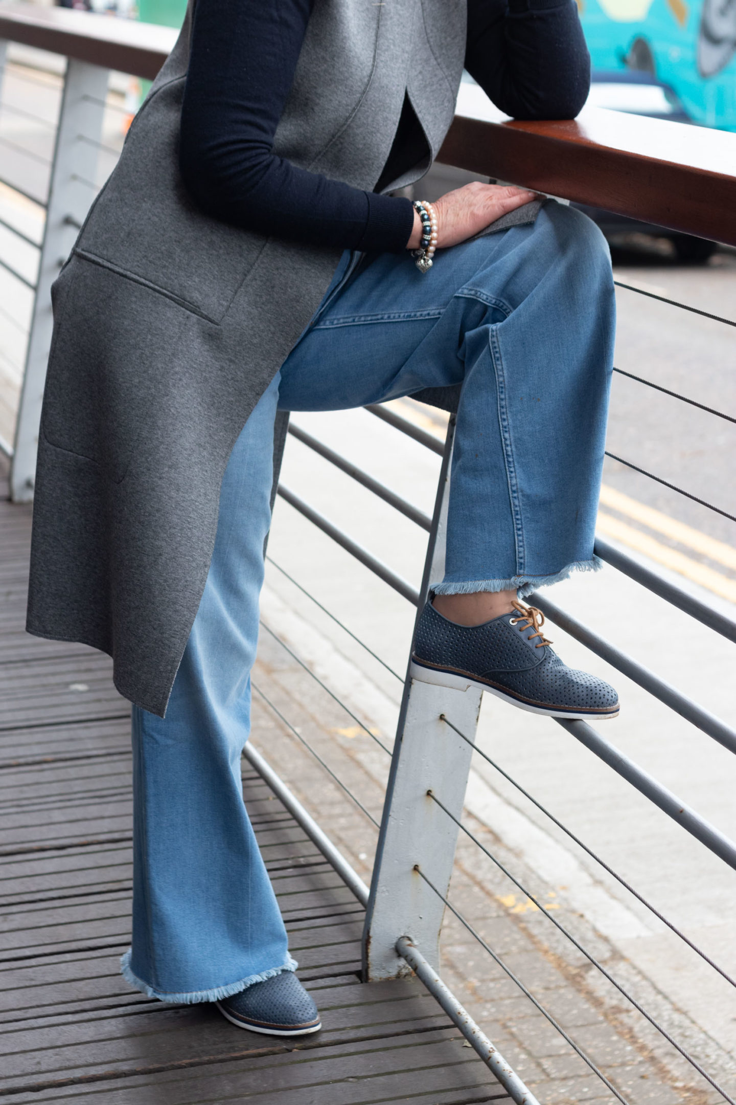 Wide leg jeans and lace-up shoes