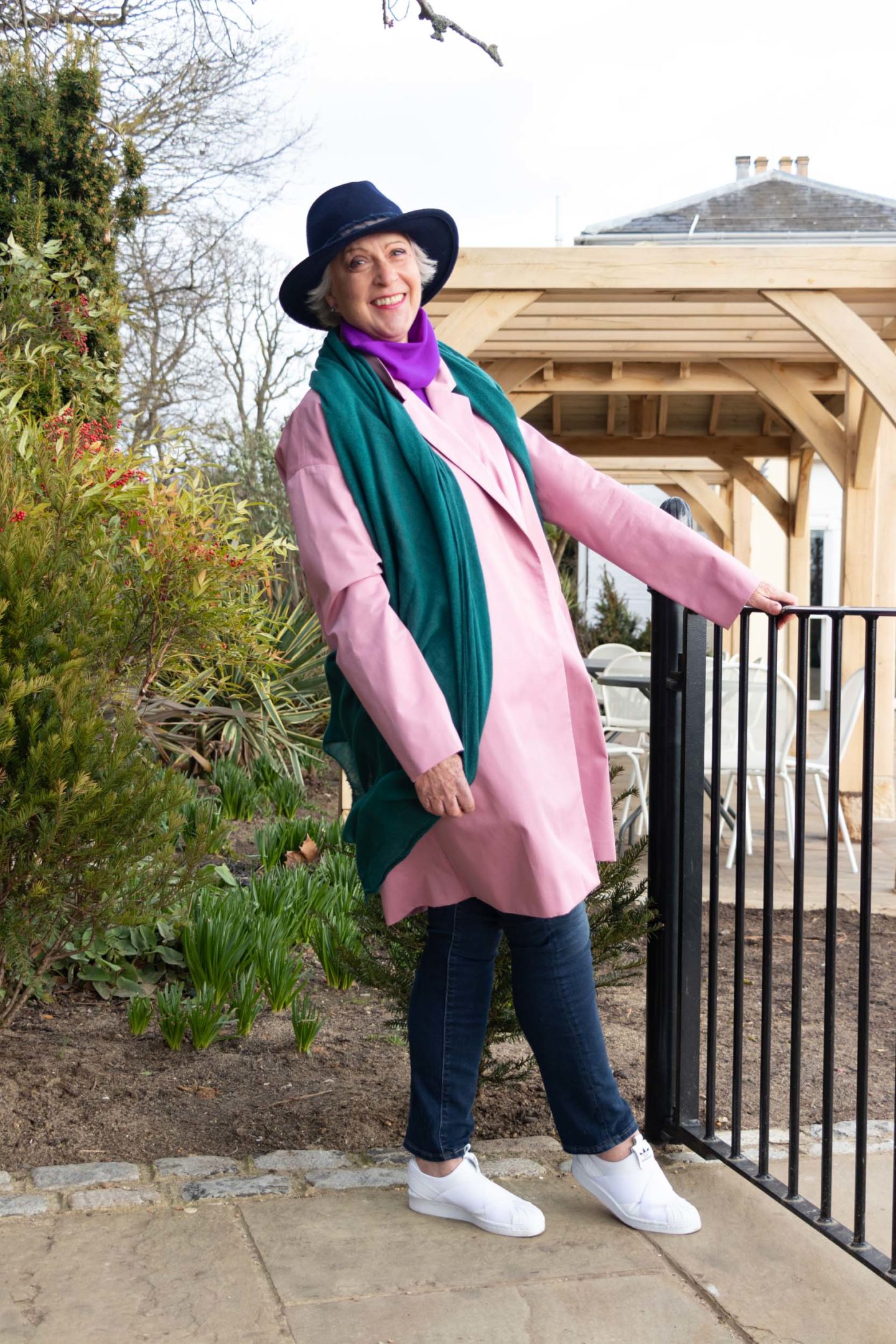 Pink coat and green scarf