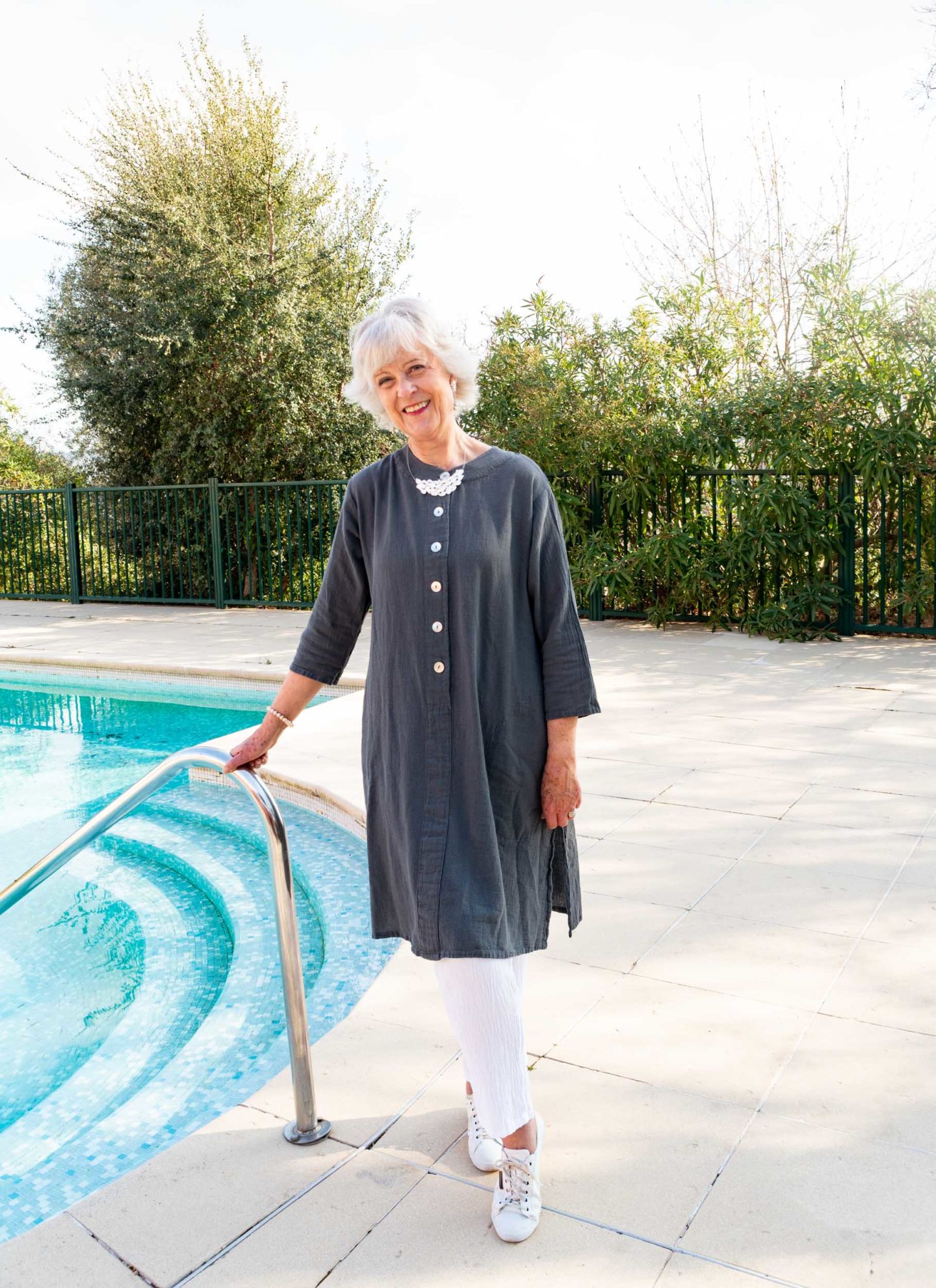 Grey cotton tunic and white trousers