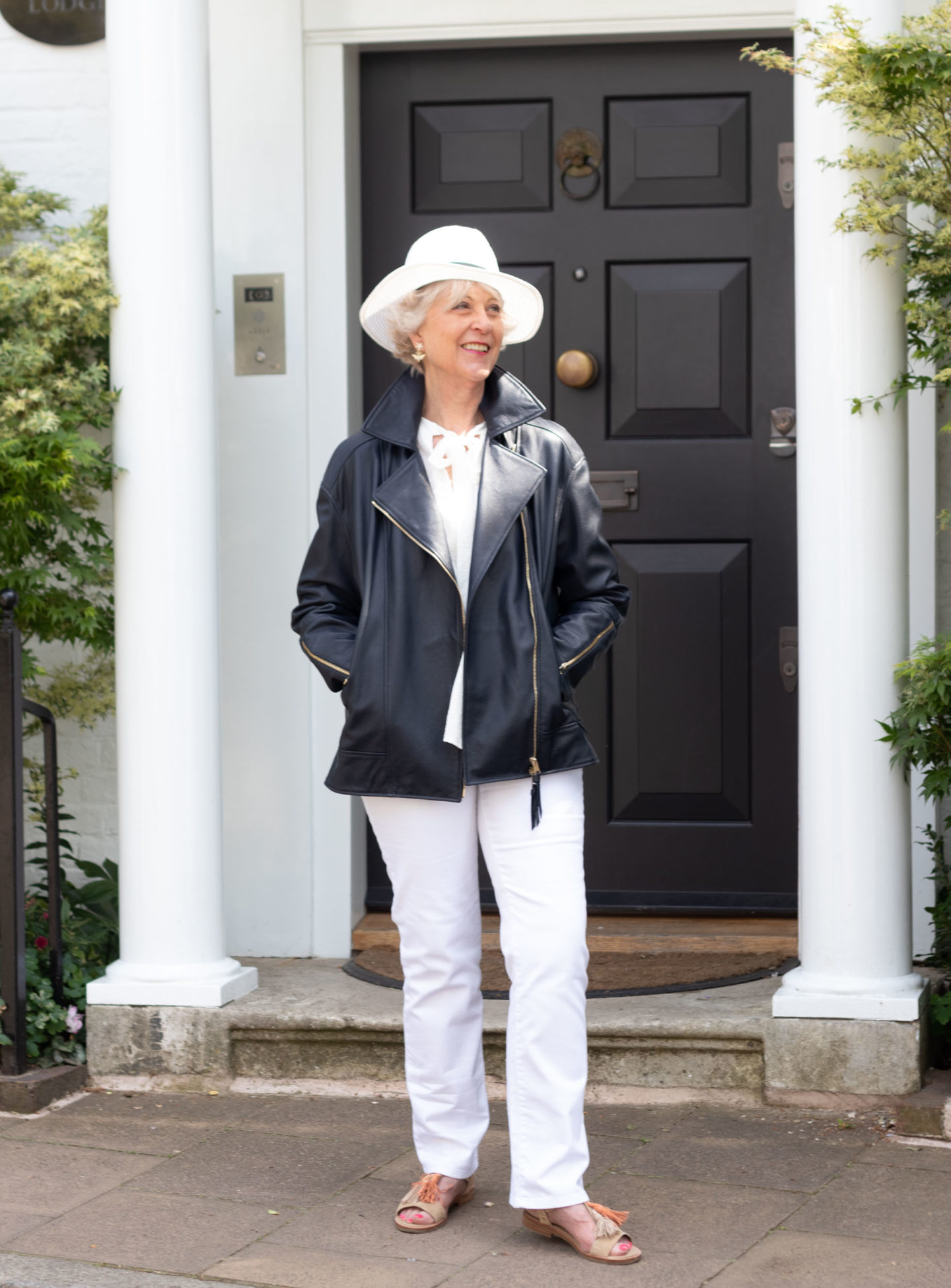 White jeans and leather jacket