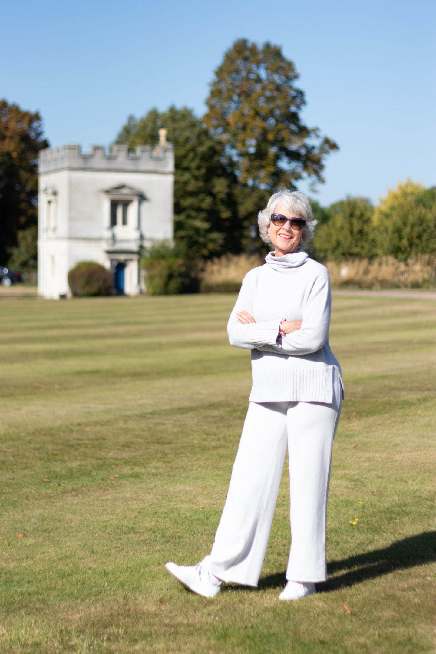 Light grey polo neck and trousers