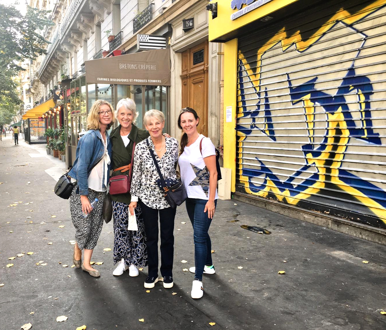 Two generations of friends enjoy Paris.