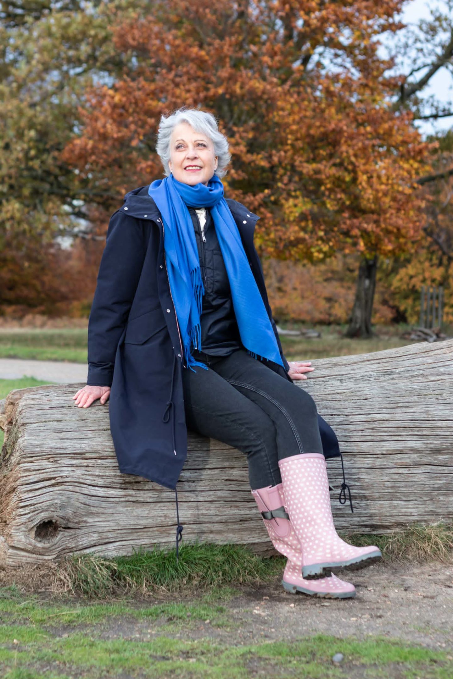 Navy parka and pink wellies