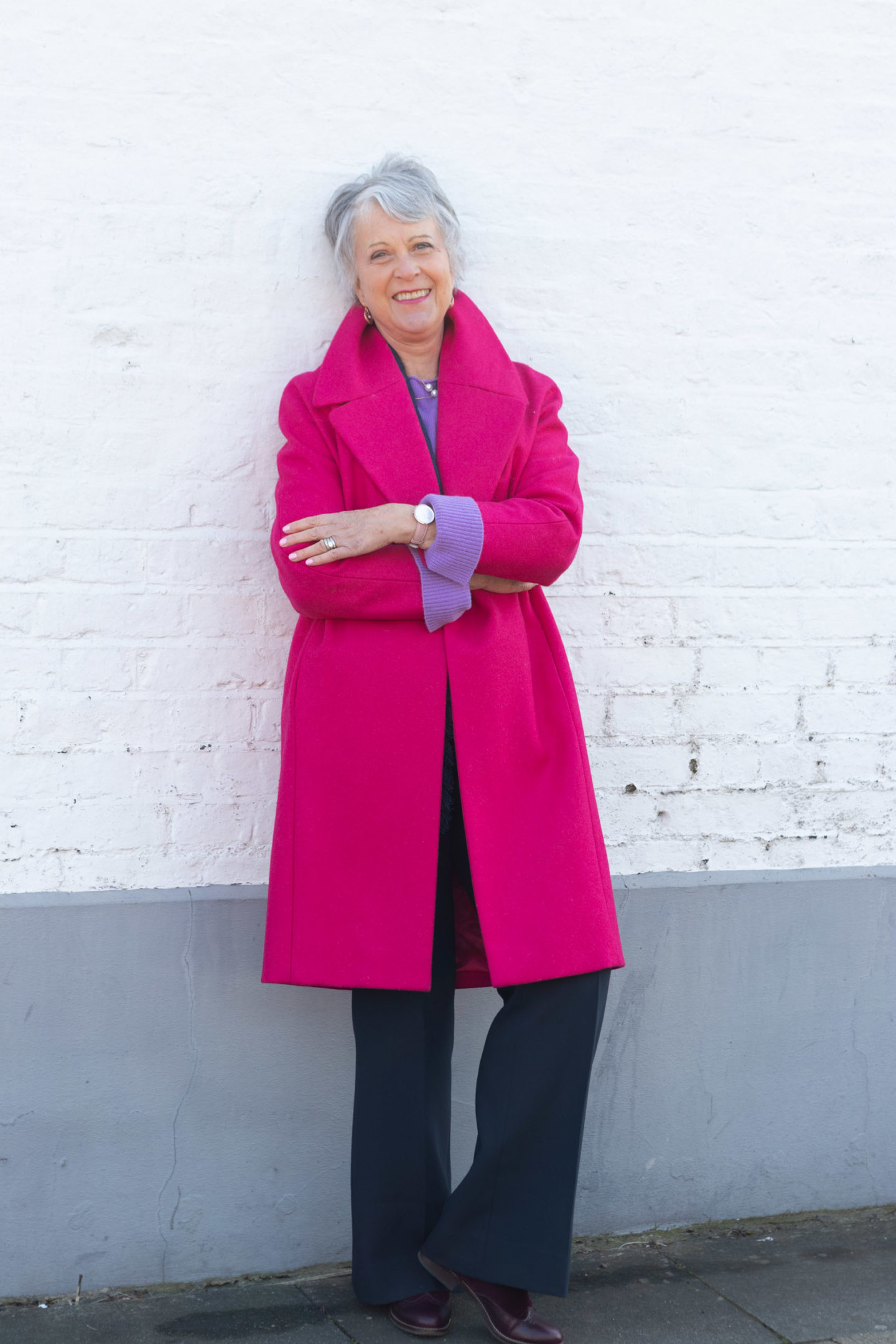 Pink coat and purple sweater