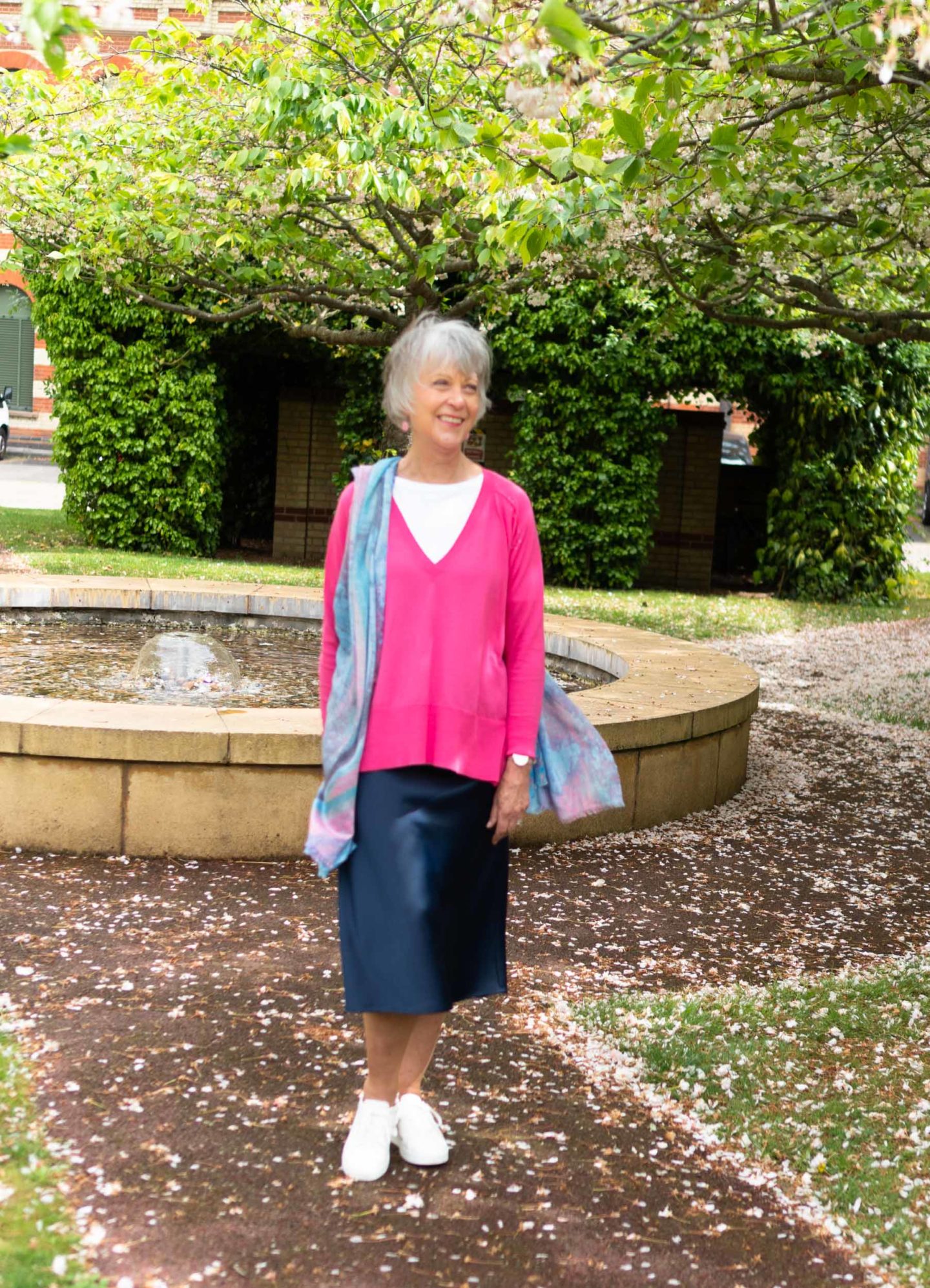 Navy midi skirt and pink sweater