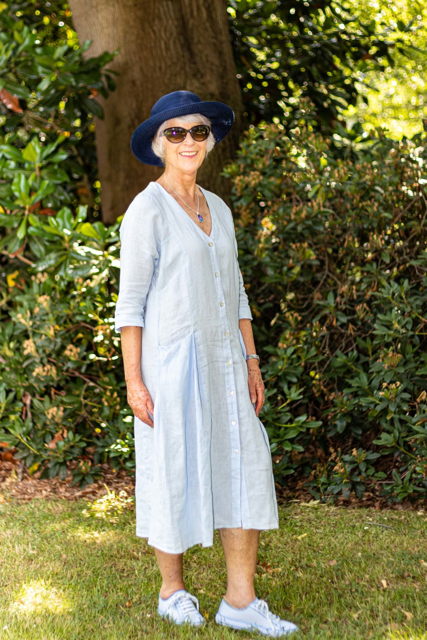 Blue linen dress and sunhat