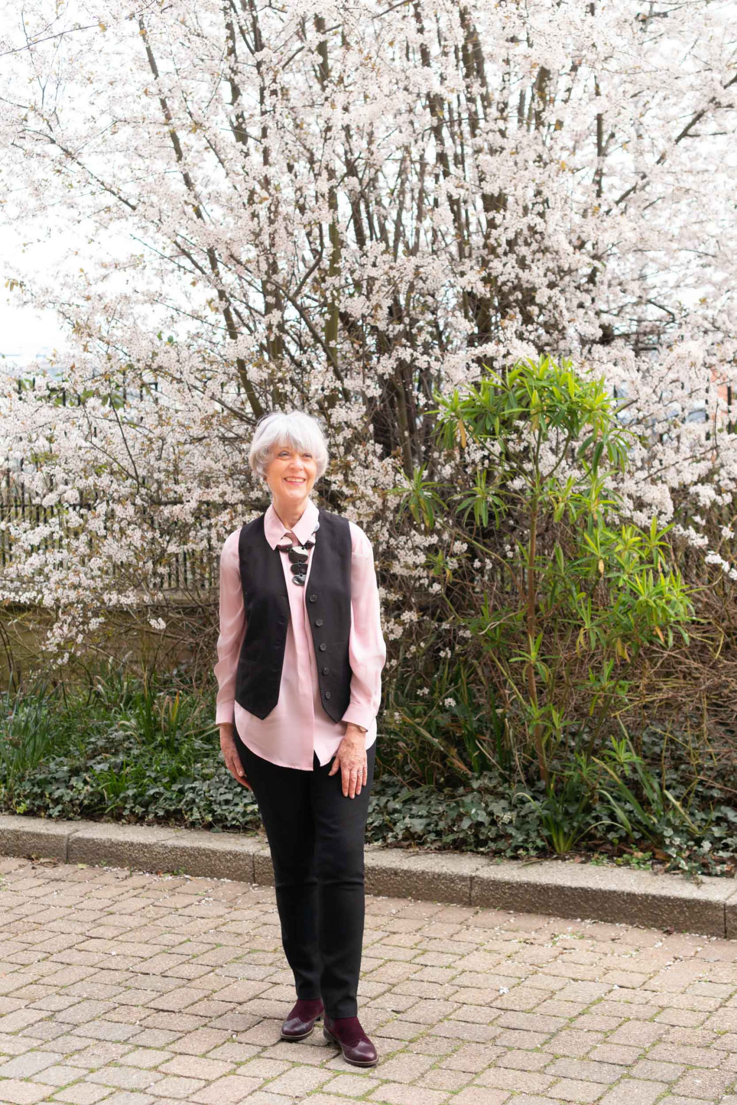 Pink silk shirt and black waistcoat
