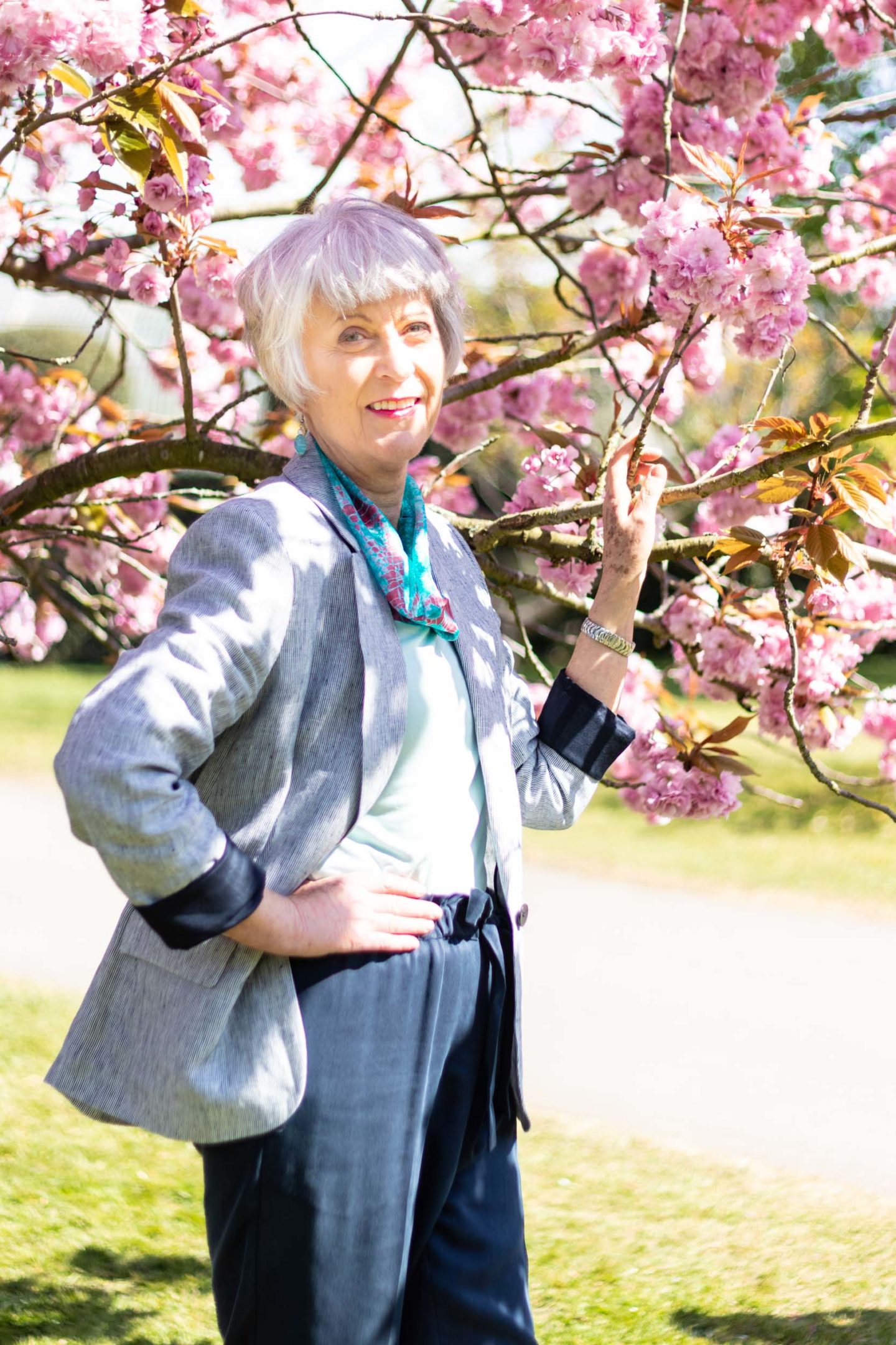 Casual Spring outfit. stripe blazer and green top and scarf