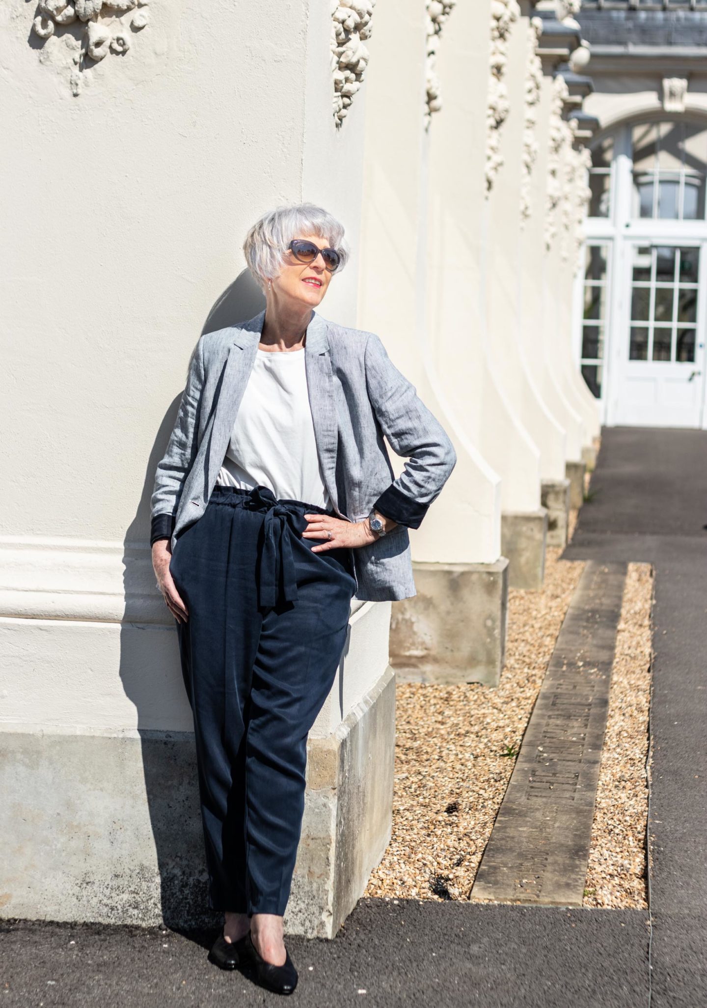 Navy and white stripe linen jacket and navy trousers