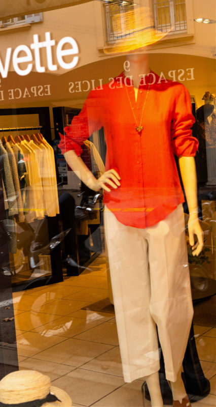Orange shirt and white trousers