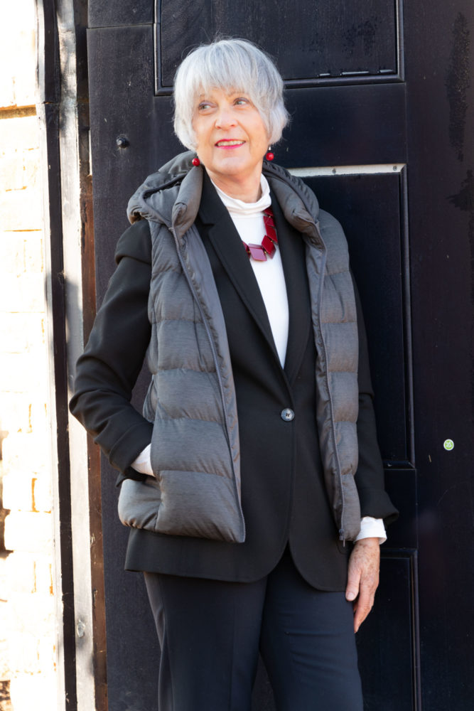 Grey puffs waistcoat, black jacket. Warm layers