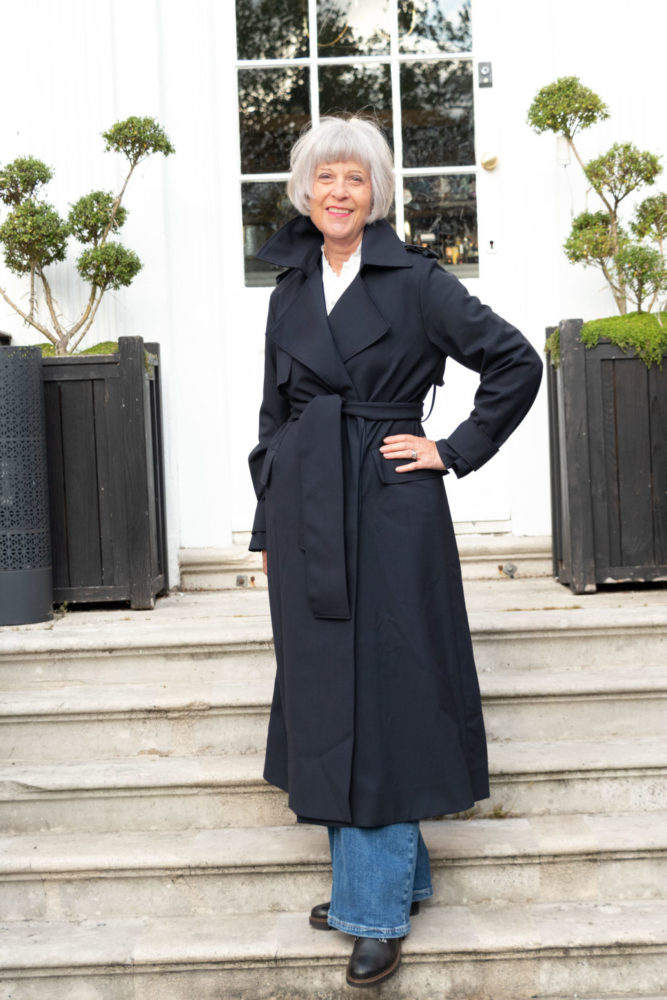 Navy trench coat and jeans