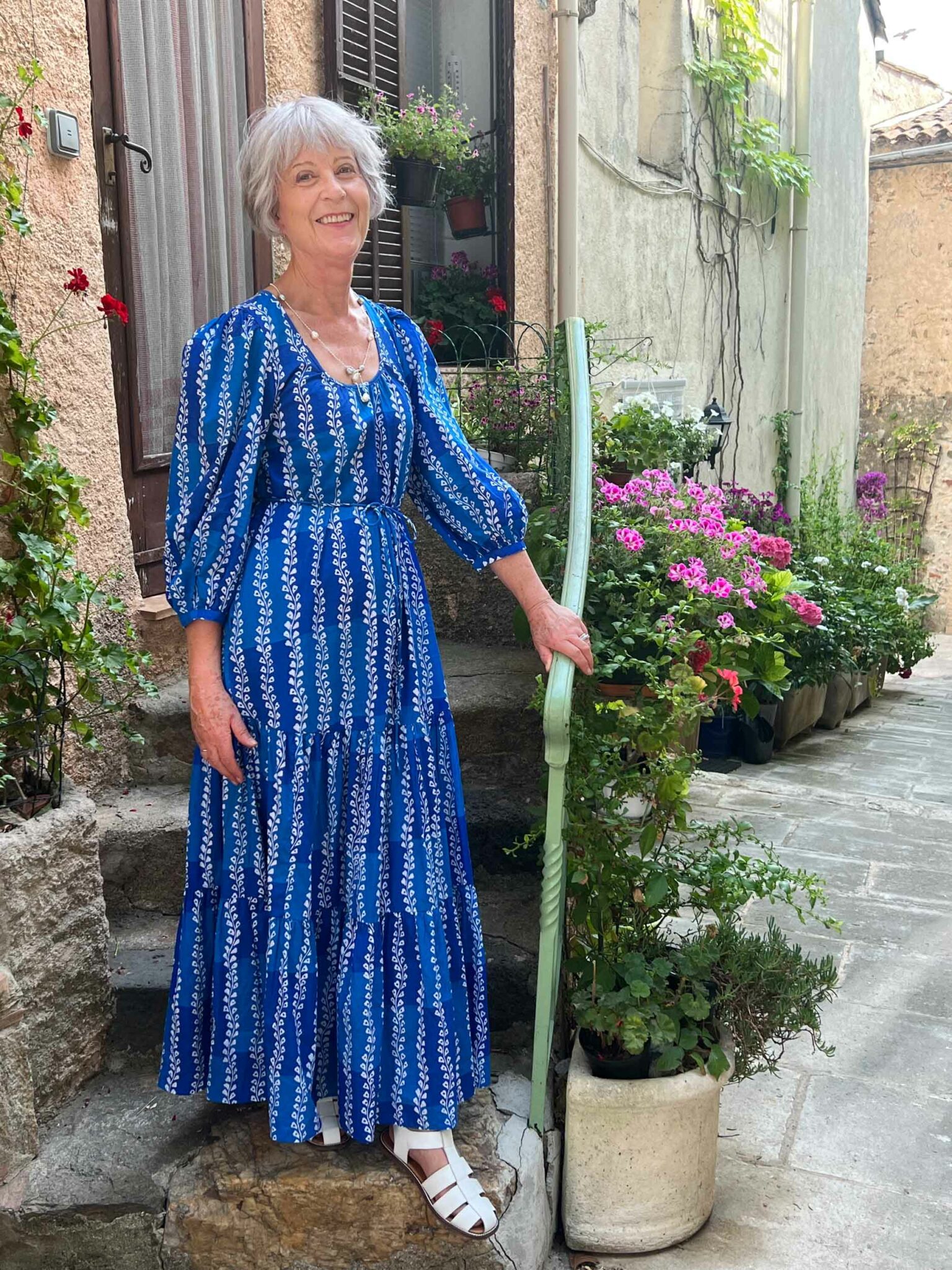 Blue print maxi dress and white sandals
