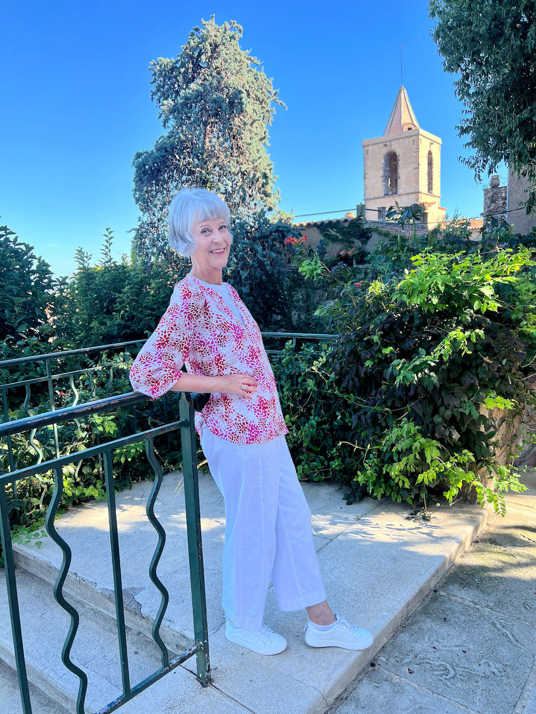 White trousers and print silk top