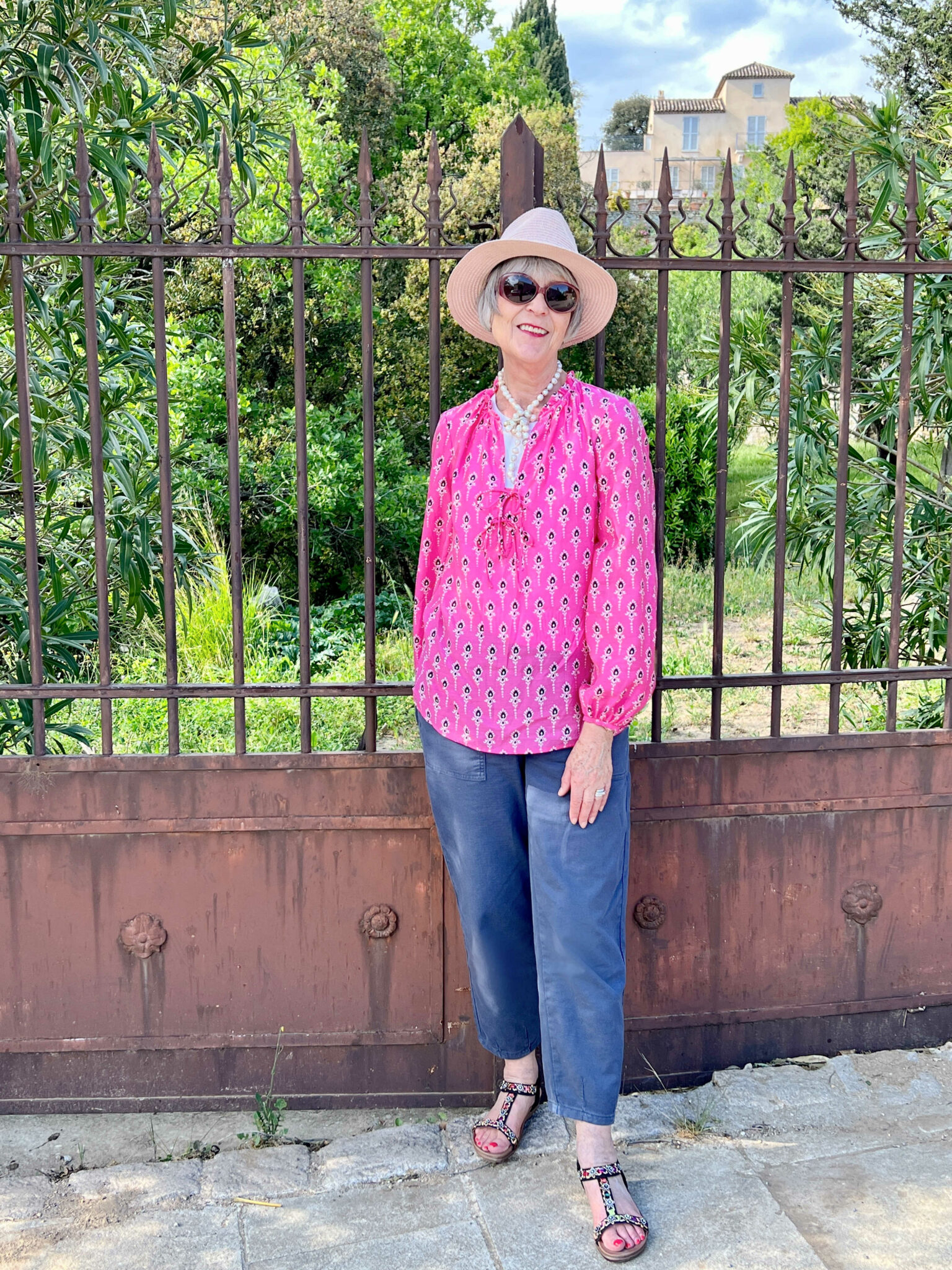 Print blouse, jeans and sandals
